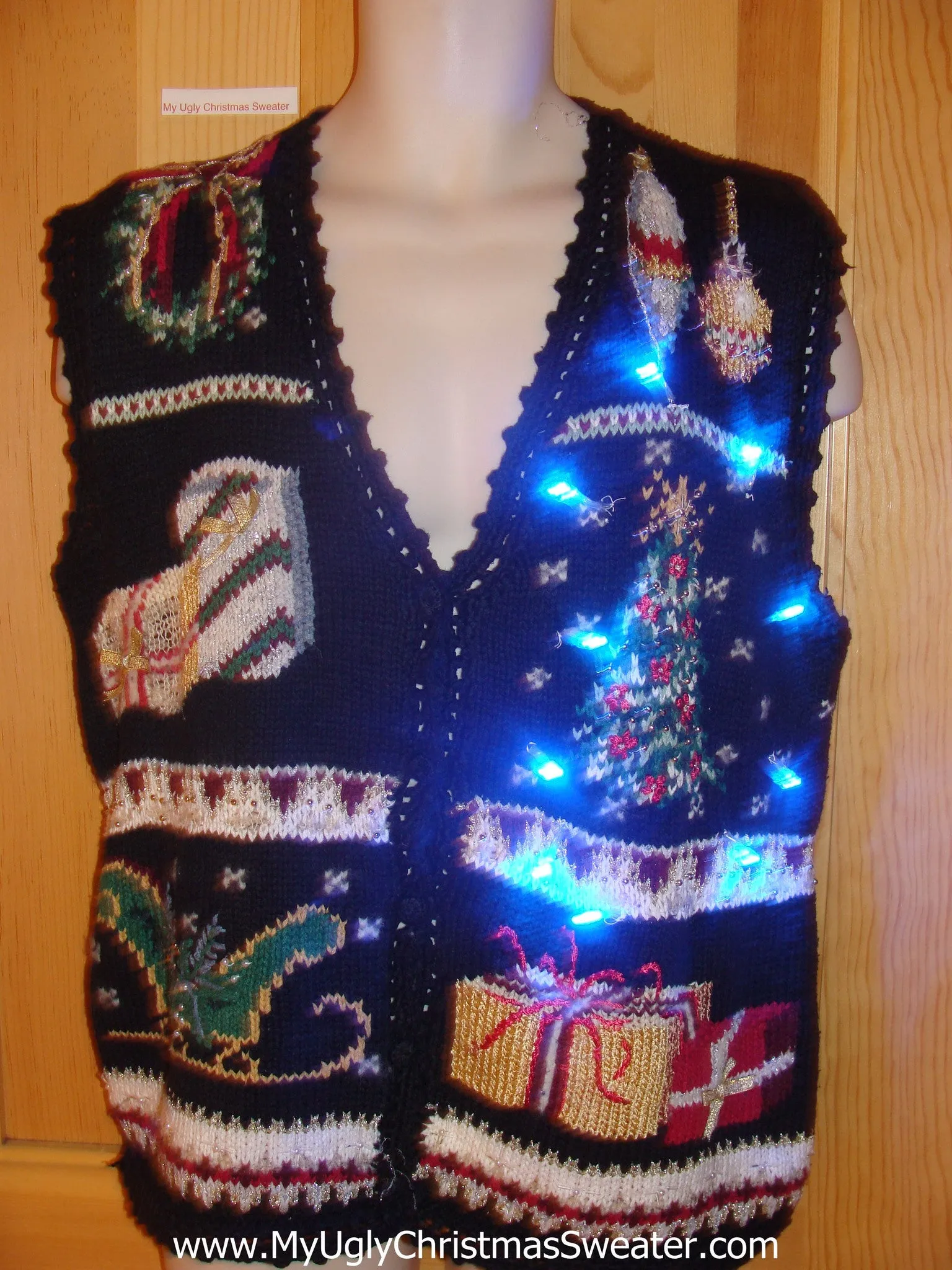 Need to Buy Christmas Sweaters? Light Up Sweater Vest Tree, Sleigh, Gifts