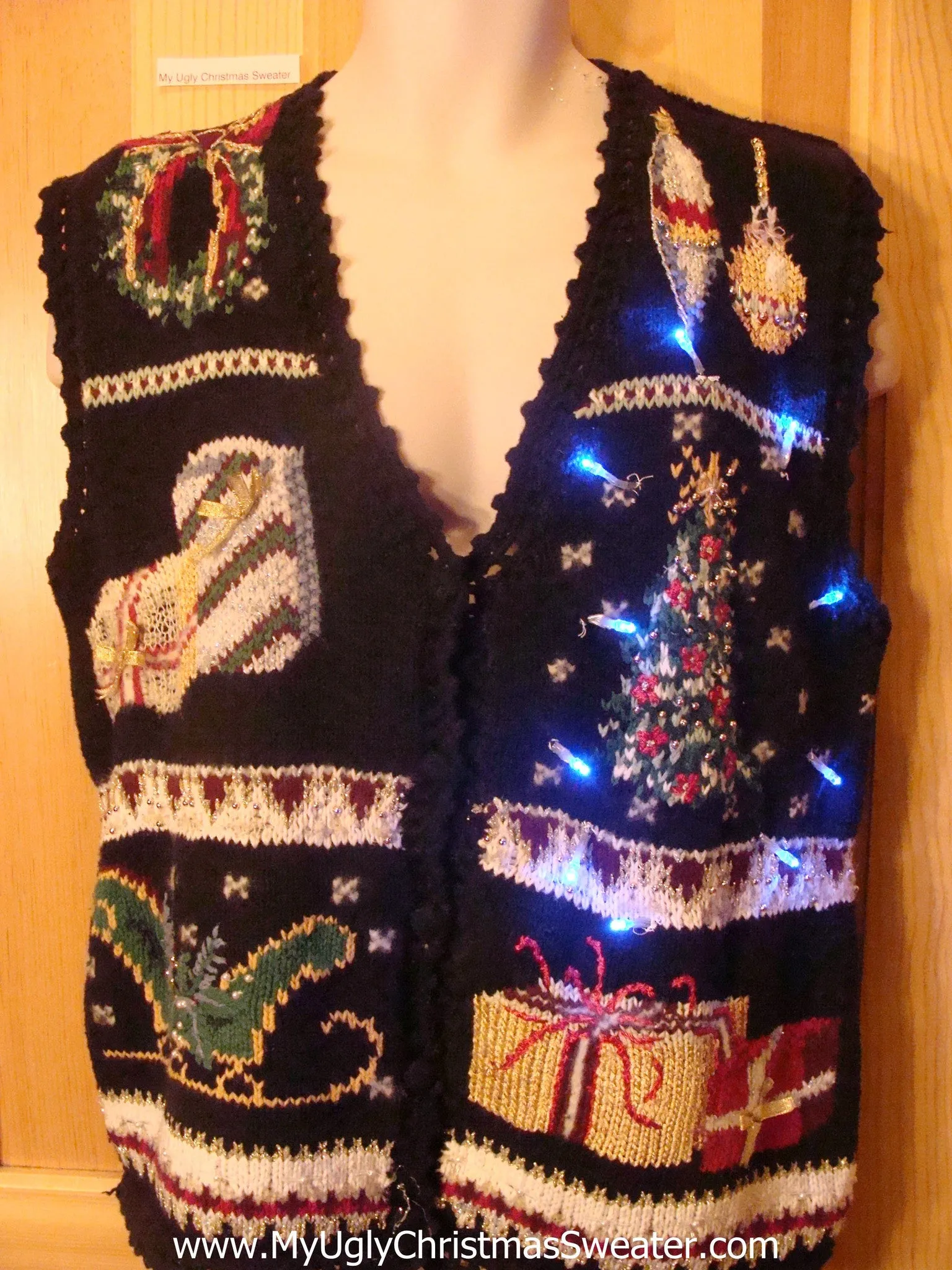 Need to Buy Christmas Sweaters? Light Up Sweater Vest Tree, Sleigh, Gifts